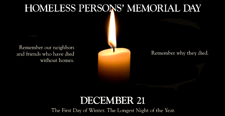 candle lit with a dark background as a memorial for people who have passed away due to homelessness
